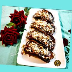 A picture of Chocolate Cake Tacos With Vanilla cream filling.