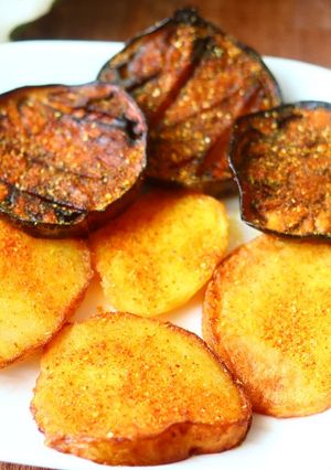 A picture of Fried brinjals and potatoes.