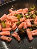 Pink pasta with sprouting broccoli and anchovies