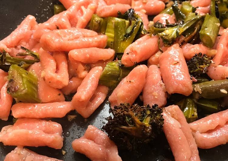 Pink pasta with sprouting broccoli and anchovies