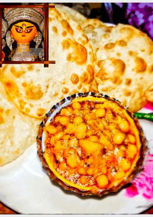 নিরামিষ  হিং নারকেলি ঘুগনি ও খাস্তা হিং পুরি (ghuuni o khasta hing puri recipe in Bengali) রেসিপির প্রধান ছবি
