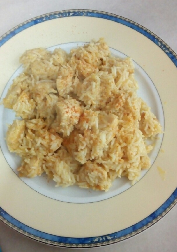 Una foto de Pollo con curry, leche de coco y arroz basmati