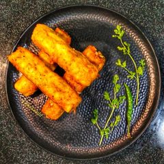 A picture of Fried egg potato roll.