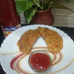 A picture of Moong Daal & Mix Veg Chila.