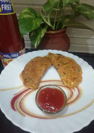 A picture of Moong Daal & Mix Veg Chila.