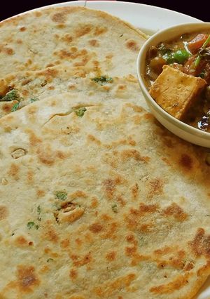 A picture of Paneer stuffed masala parotta.