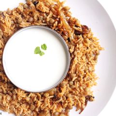 A picture of Green Lentil-Rice with Yogurt Sauce.