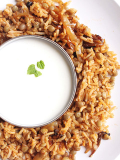 A picture of Green Lentil-Rice with Yogurt Sauce.