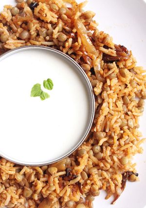 A picture of Green Lentil-Rice with Yogurt Sauce.