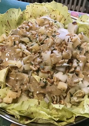 Une photo de Salade d'endives et Castelfranco aux pignons de pin et leerdammer