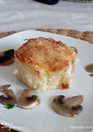 Foto di Tortino con cuore filante patate e funghi champignon