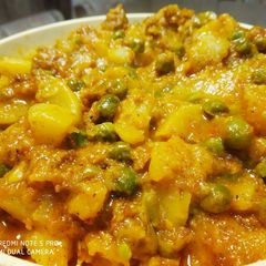 A picture of Masala warri, shalgam and peas.