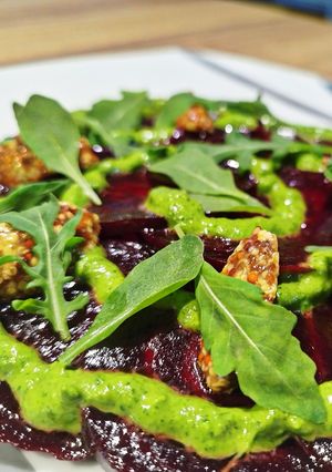 A picture of Beet Carpaccio with Arugula Mayo 🌿🫜.