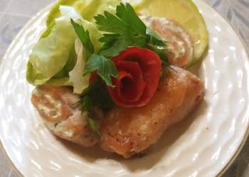 Unique Cuisine Salmon roll with white cheese and aromatic herbs Yummy