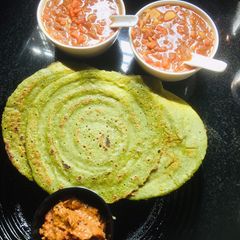 A picture of Vallarai spinach adai with shallots chutney.