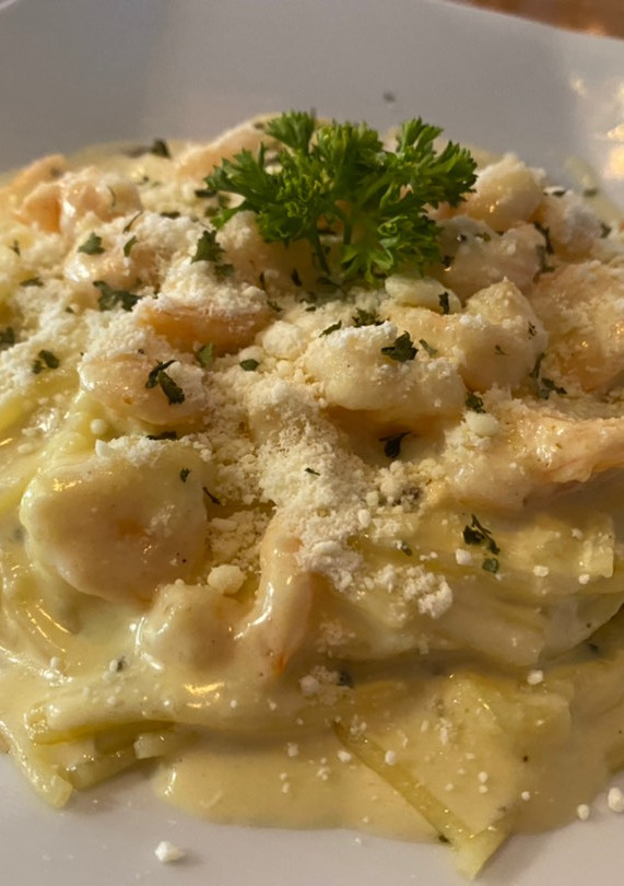 Una foto de Pasta en salsa de camarón
