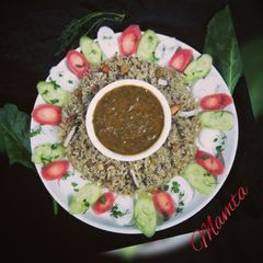 A picture of Sindhi Sai bhaji with Tehri(sweet jagerry rice).