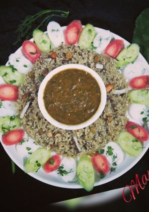 A picture of Sindhi Sai bhaji with Tehri(sweet jagerry rice).