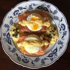 A picture of California Farm Eggs Royale with cured salmon.