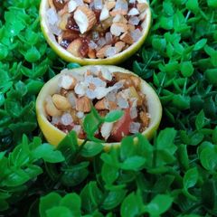 A picture of Dry fruits and fruits dessert.