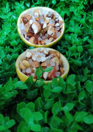A picture of Dry fruits and fruits dessert.