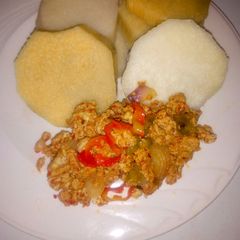 A picture of Boiled yam and egg sauce.