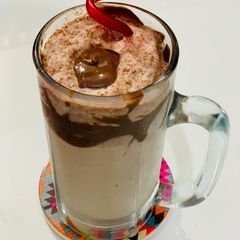 A picture of Chocolate shake from chocolate chip ice-cream.