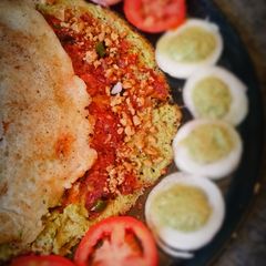 A picture of Walnut filled dosa with walnut chutney.