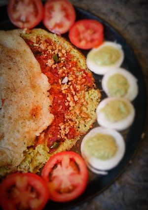 A picture of Walnut filled dosa with walnut chutney.