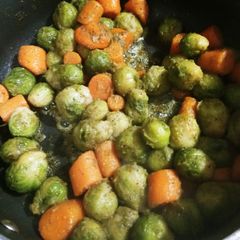 A picture of Sautéed Baby Bussel Sprouts and Carrots.