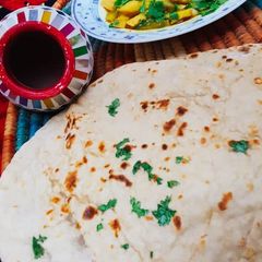 Garlic and coriander Naan A picture of Garlic and coriander Naan.