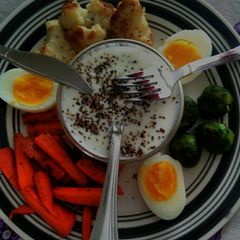 A picture of Vegetable stir fry  and boiled egg.