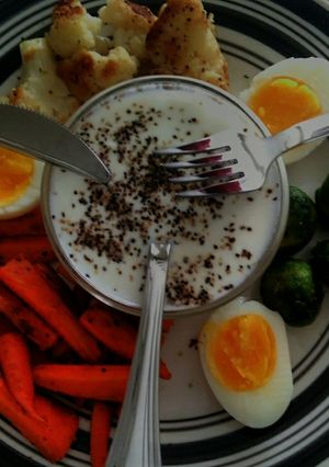 A picture of Vegetable stir fry  and boiled egg.