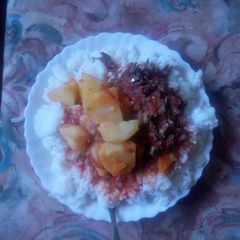 A picture of White rice, omena and tomato and potato soup.