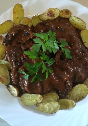 Una foto de Ossobucco al vino tinto