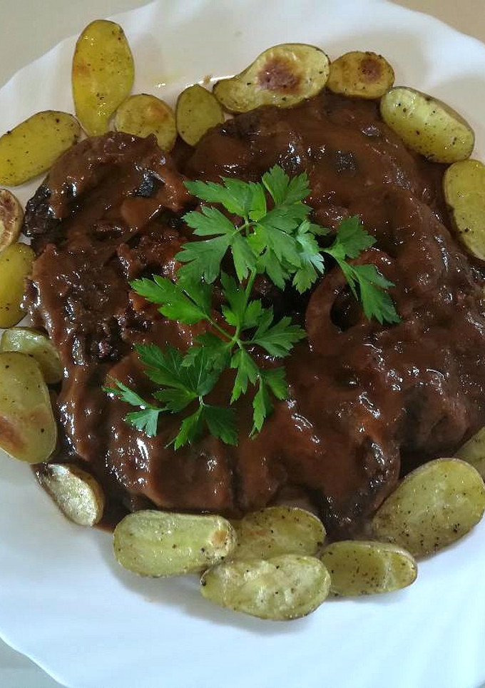 Una foto de Ossobucco al vino tinto