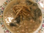 Una foto de alubias con tomate