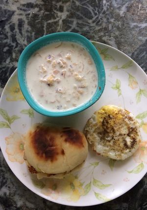 A picture of Homemade bun with egg half fry.