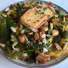 A picture of Lawn Greens and Uniq Fruit Salad.