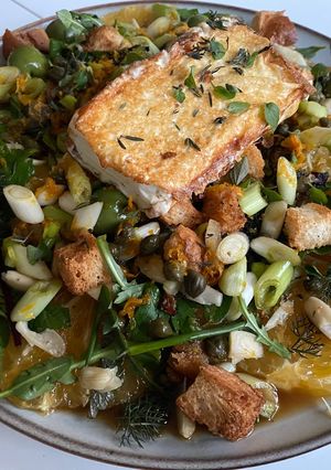 A picture of Lawn Greens and Uniq Fruit Salad.