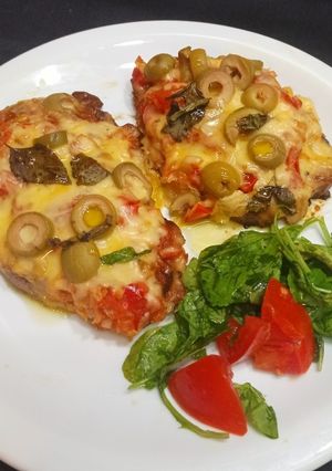 Una foto de Bifes de bondiola a la pizzaiola