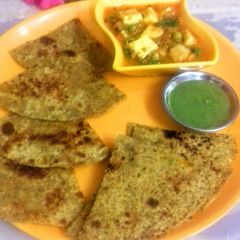 A picture of Churi Paratha with Peas-Paneer Curry.