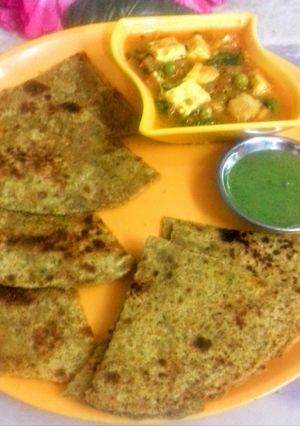 A picture of Churi Paratha with Peas-Paneer Curry.