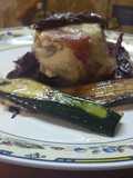 Tortino di spigola  in camicia di  lardo di colonnata