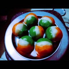 A picture of Delicious tasty tricolour ladoo.