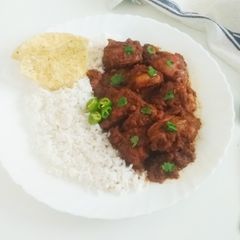 A picture of Malvani Chicken Curry.