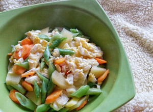 A picture of Stir Fried Carrots, Green Beans, Potatoes and Egg.