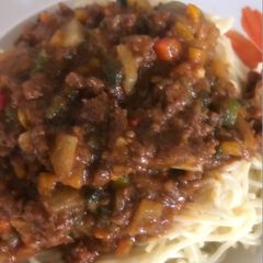 A picture of Spaghetti with beef sauce.