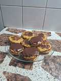 Alfajores de coco bañados en chocolate cobertura