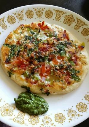 A picture of Tomato Onion Uttapam.